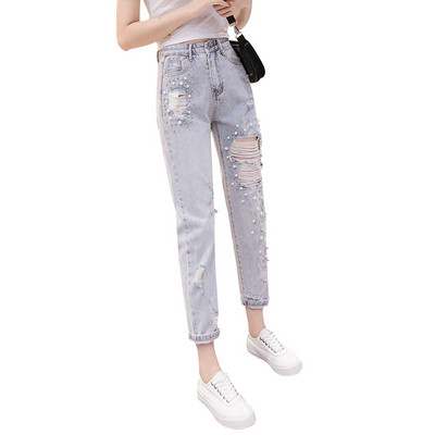 Blugi de dama actuali cu perle decorative si motive rupte