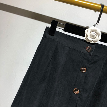 Hosszú alkalmi szoknya fekete gombokkal