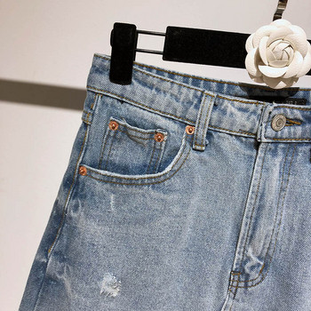 Fusta scurta din denim cu buzunare in albastru