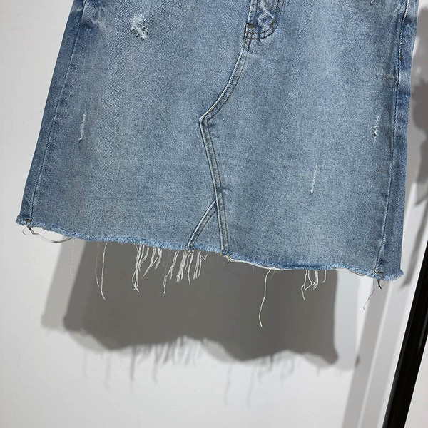 Fusta scurta din denim cu buzunare in albastru