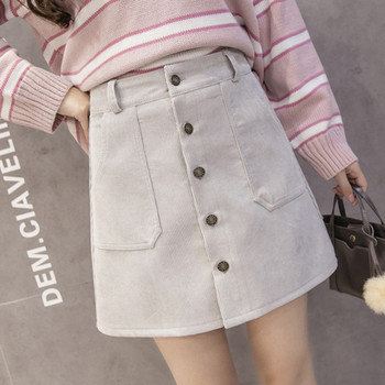 Fusta de dama moderna in patru culori cu buzunare si nasturi