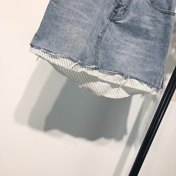 Fusta scurta din denim cu buzunare in albastru si negru