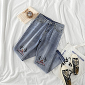 Blugi moderni de dama cu talie inalta si broderii in albastru