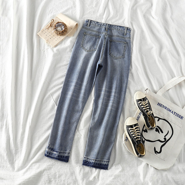 Blugi moderni de dama cu talie inalta si broderii in albastru