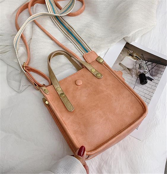 Geanta de dama moderna din piele ecologica in mai multe culori si pandantiv