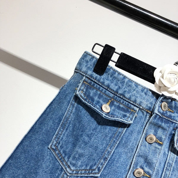 Fusta asimetrica din denim cu buzunare in albastru