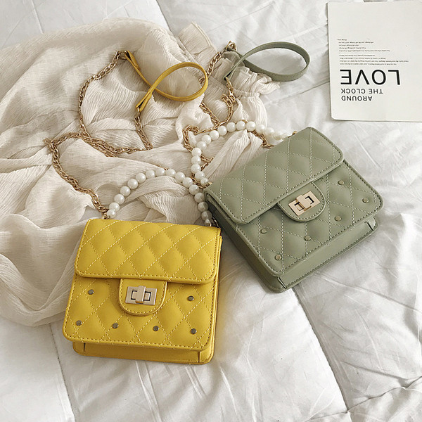 Geanta de dama moderna cu inchidere metalica