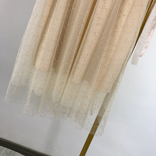 Fusta dama din tul de culoare bej cu efect stralucitor