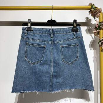 Fusta scurta din denim cu buzunare in albastru