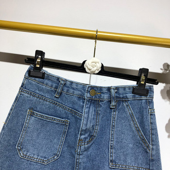 Fusta scurta din denim cu buzunare in albastru