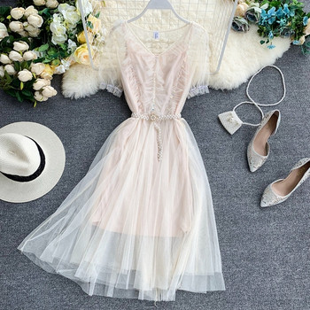 Rochie moderna de dama cu tul si perle decorative