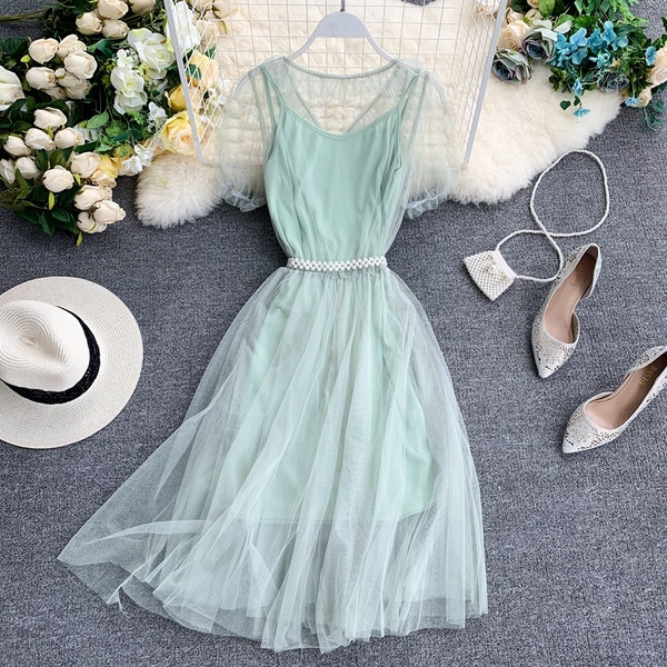 Rochie moderna de dama cu tul si perle decorative