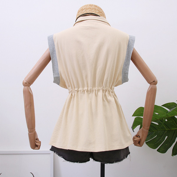 Model nou de vesta dama cu cravate in doua culori