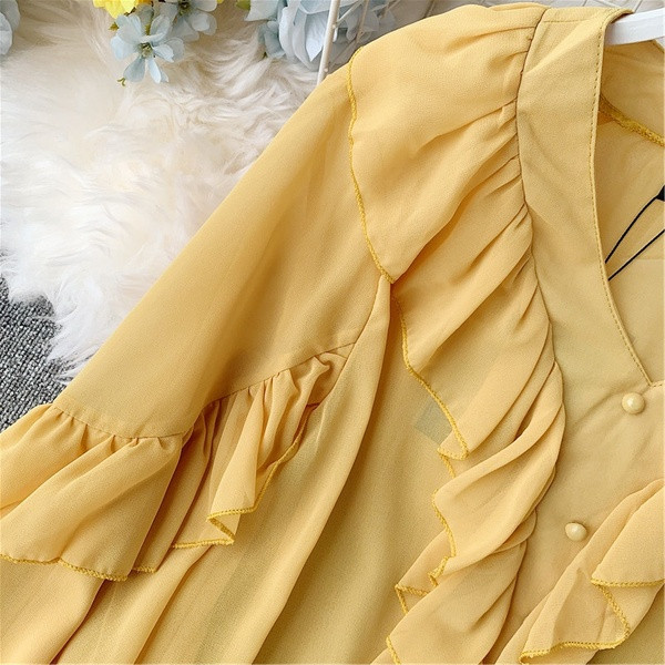 Cămașă modernă de damă cu decolteu în V de culoare galbenă