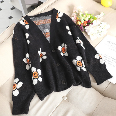 Vesta moderna de dama cu motive florale in negru si verde