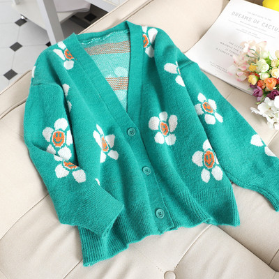 Vesta moderna de dama cu motive florale in negru si verde