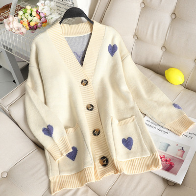 Vesta moderna de dama cu nasturi in alb, rosu si albastru