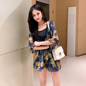 Salopeta de dama moderna cu maneci 3/4 in doua culori si model floral