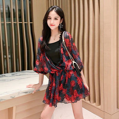 Salopeta de dama moderna cu maneci 3/4 in doua culori si model floral