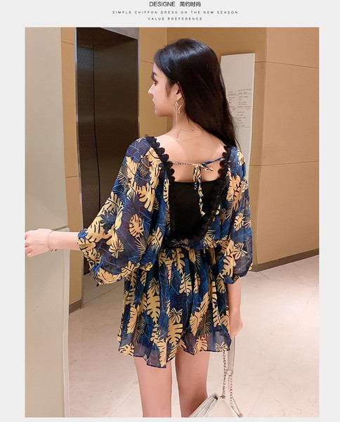 Salopeta de dama moderna cu maneci 3/4 in doua culori si model floral