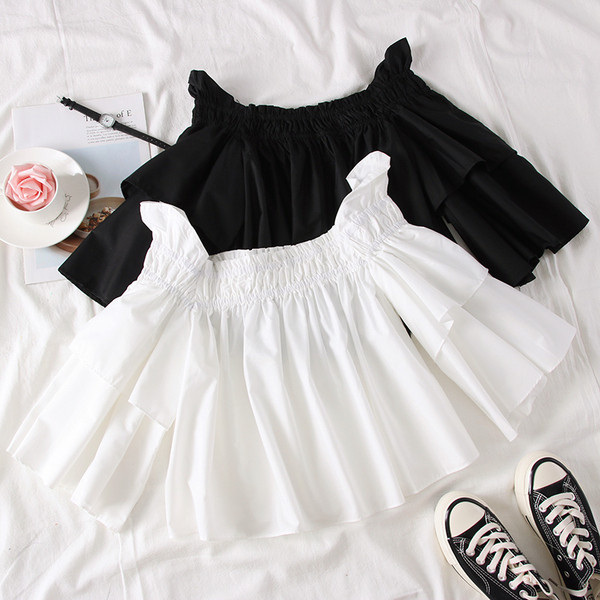 Bluză de damă modernă cu umerii goi, în alb și negru