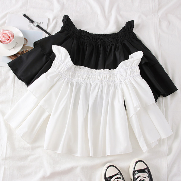 Bluză de damă modernă cu umerii goi, în alb și negru