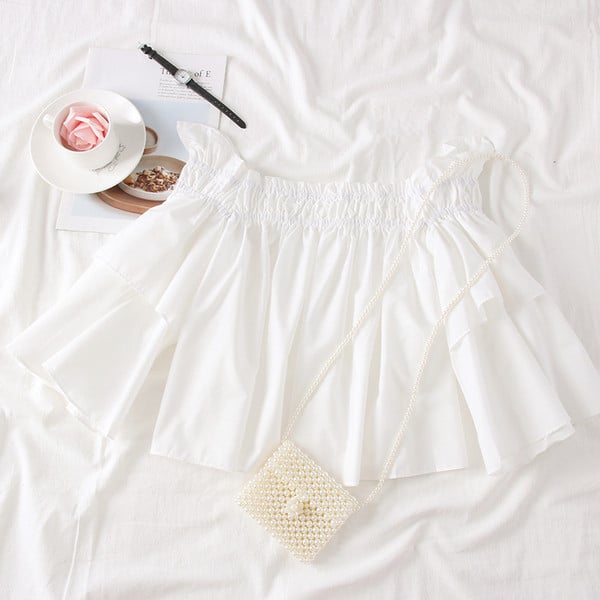 Bluză de damă modernă cu umerii goi, în alb și negru