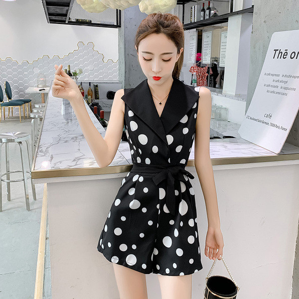 Salopeta de dama de culoare neagra cu puncte cu decolteu in V