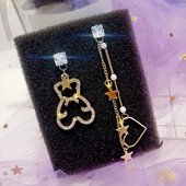 Cercei moderni de dama - in culoare aurie cu pietre