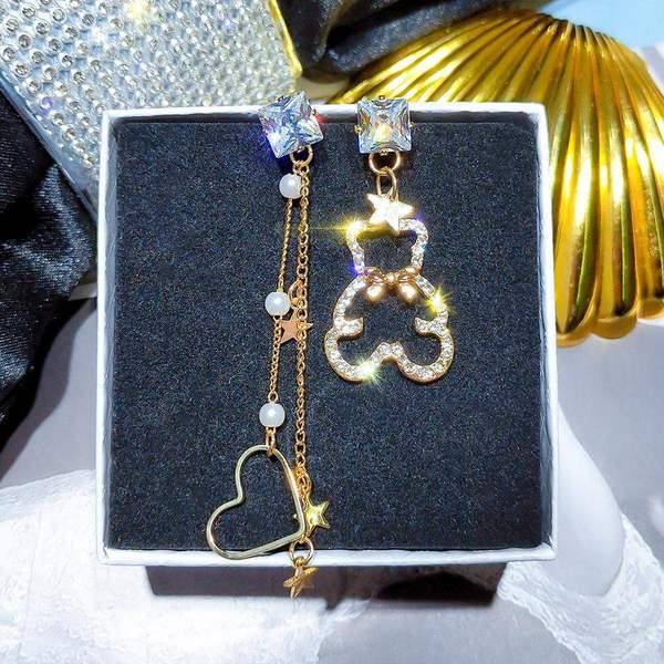 Cercei moderni de dama - in culoare aurie cu pietre