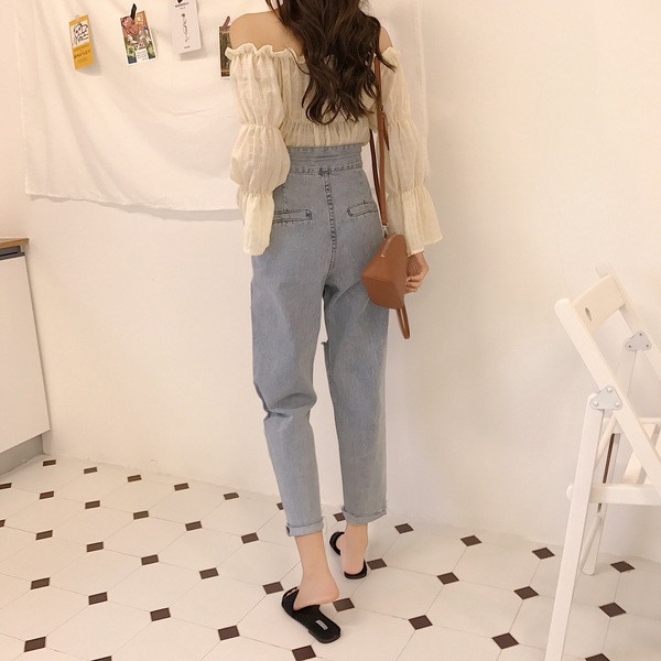 Blugi de dama moderni cu talie inalta si motive rupte