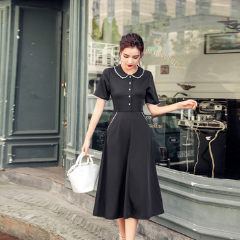 Rochie moderna de dama cu maneci scurte si nasturi in negru