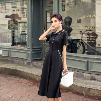 Rochie moderna de dama cu maneci scurte si nasturi in negru