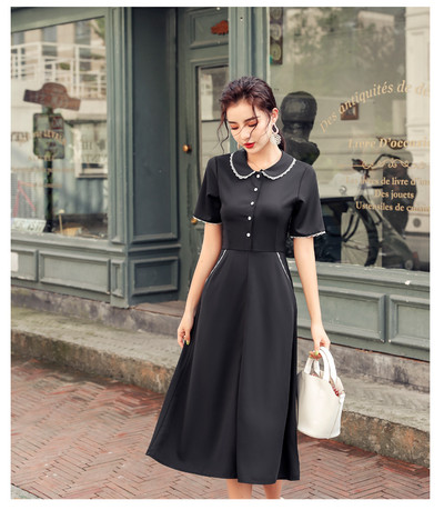 Rochie moderna de dama cu maneci scurte si nasturi in negru