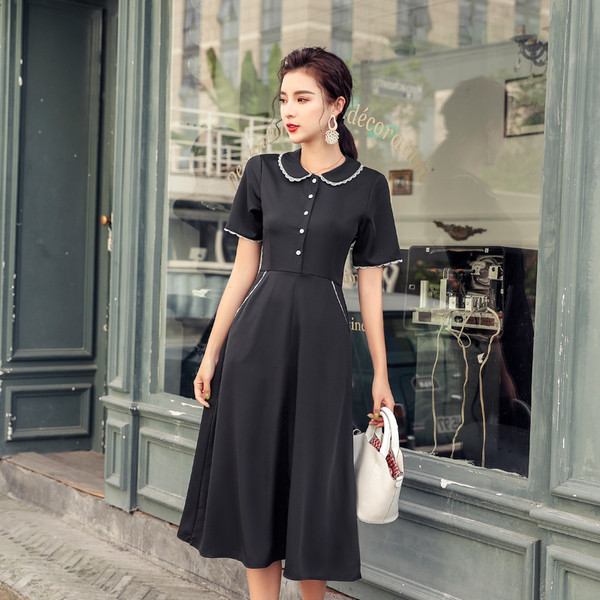 Rochie moderna de dama cu maneci scurte si nasturi in negru