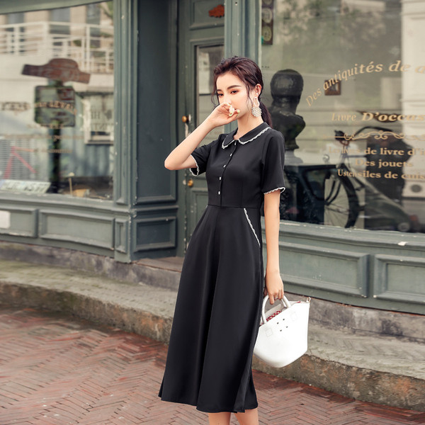 Rochie moderna de dama cu maneci scurte si nasturi in negru