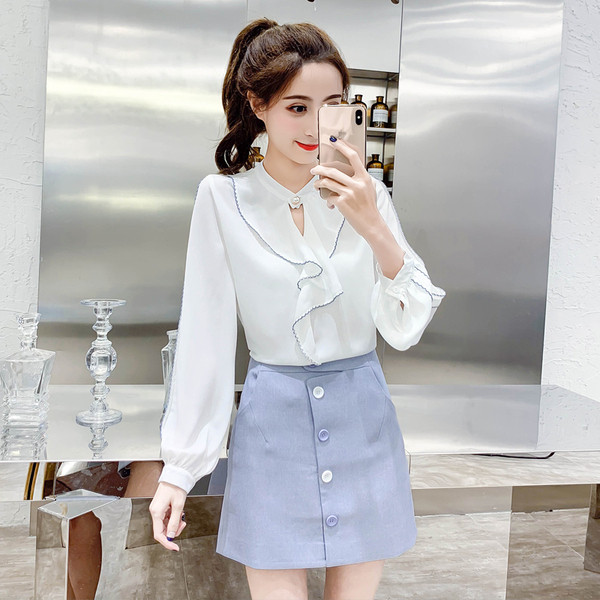 Cămașă elegantă de damă, cu mâneci lungi, în albastru și alb