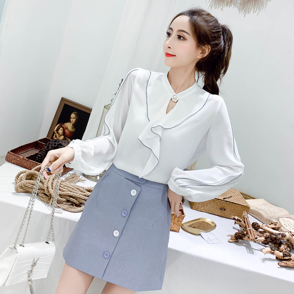 Cămașă elegantă de damă, cu mâneci lungi, în albastru și alb