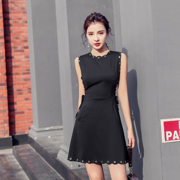 Rochie moderna de dama cu buzunar in negru si element metalic