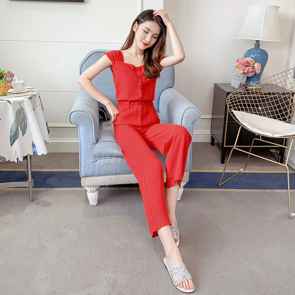 Salopeta de dama eleganta cu nasturi in alb si negru