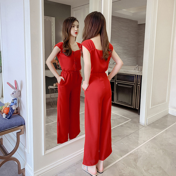 Salopeta de dama eleganta cu nasturi in alb si negru