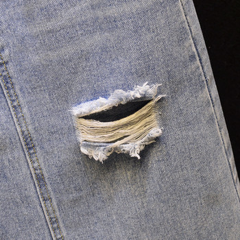 Fusta de dama actuala din denim cu motive rupte