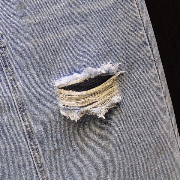 Fusta de dama actuala din denim cu motive rupte