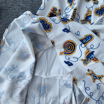 Модерна дамска рокля с презрамки в бял цвят