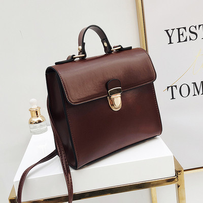 Geanta de dama eleganta din piele ecologica de culoare maro si negru