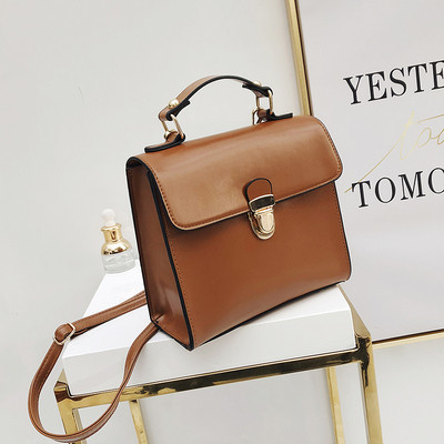 Geanta de dama eleganta din piele ecologica de culoare maro si negru