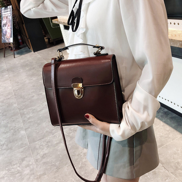 Geanta de dama eleganta din piele ecologica de culoare maro si negru