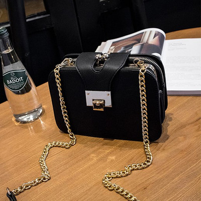 Geanta de dama moderna cu maner metalic de culoare neagra