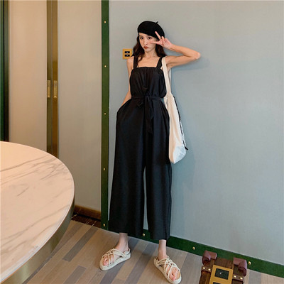 Salopetă modernă de damă cu bretele largi în roșu și negru