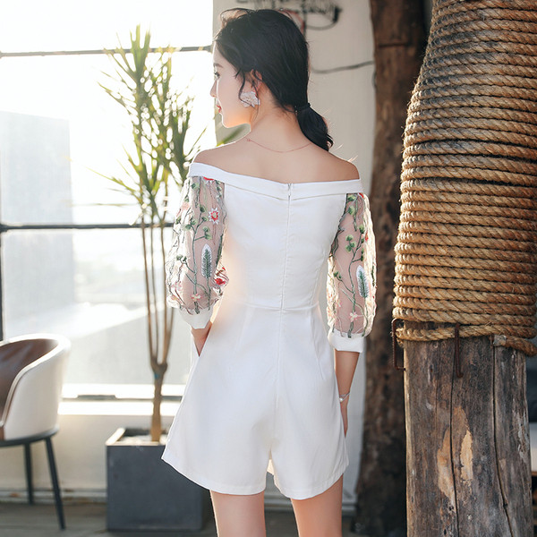 Salopeta de dama moderna cu maneci 3/4 in alb si albastru